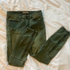 Army green free people jeans.